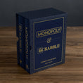 Load image into Gallery viewer, Indigo Collection Monopoly & Scrabble
